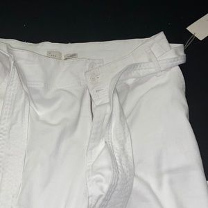 White jeans with belt